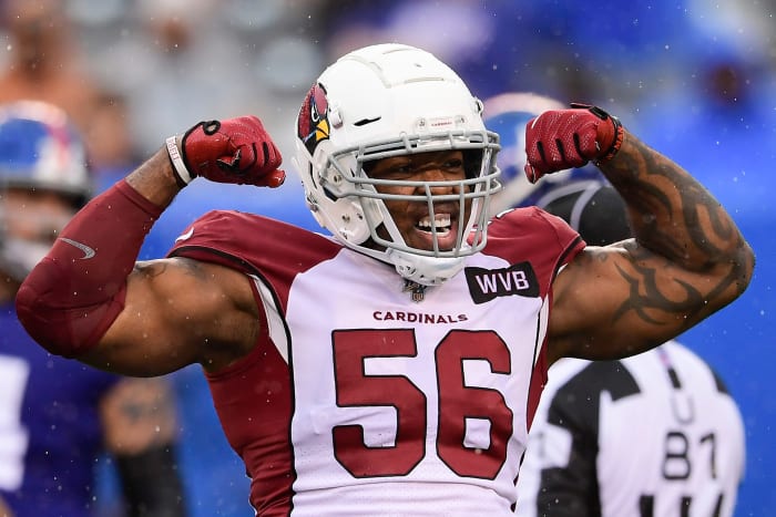 Arizona Cardinals linebacker Terrell Suggs flexes.