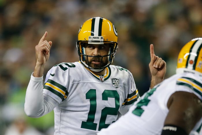 A closeup of Green Bay Packers QB Aaron Rodgers during a game.