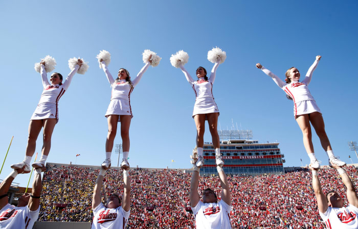 Indiana Hoosiers cheerleaders perform during the game against the Michigan Wolverines at Memorial Stadium.