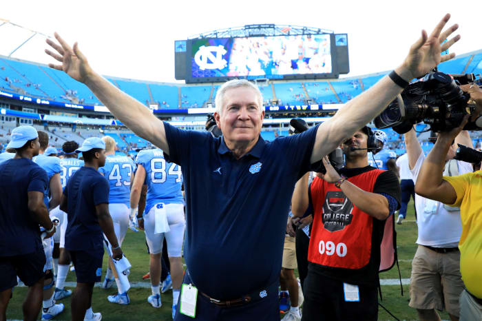 Mack Brown celebrates a win with the North Carolina Tar Heels.