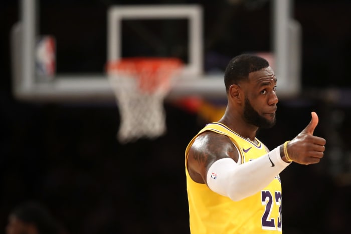 LeBron James giving a thumbs up during a game.