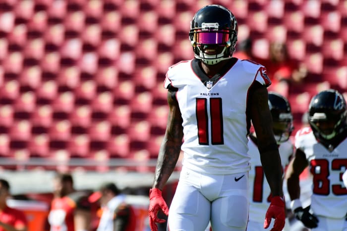 Julio Jones wearing his helmet and visor during warmups.