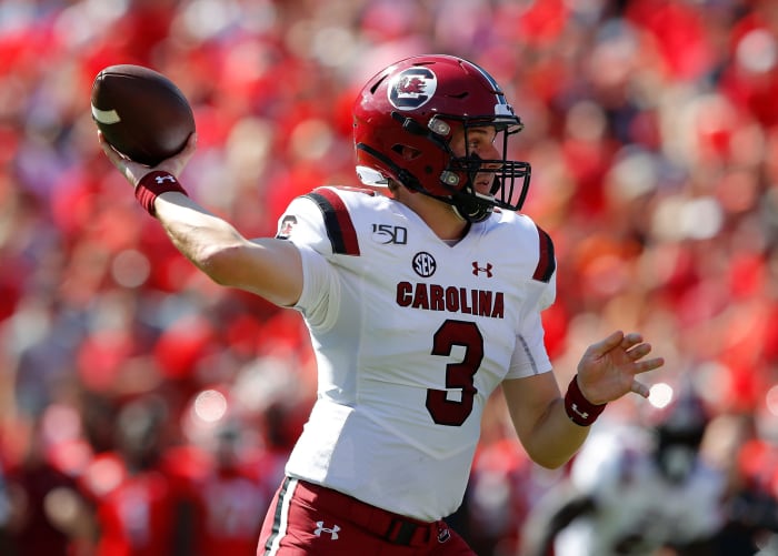 Ryan Hilinski of the South Carolina Gamecocks drops back to pass.