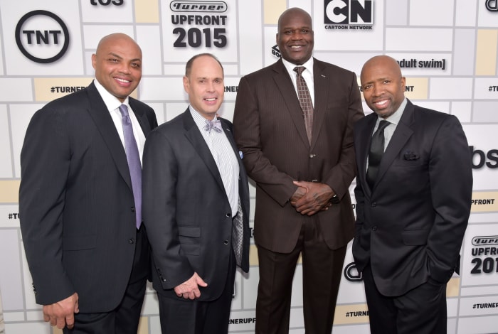 The TNT crew featuring Charles Barkley, Ernie Johnson, Shaquille O'Neal, and Kenny Smith at an event.