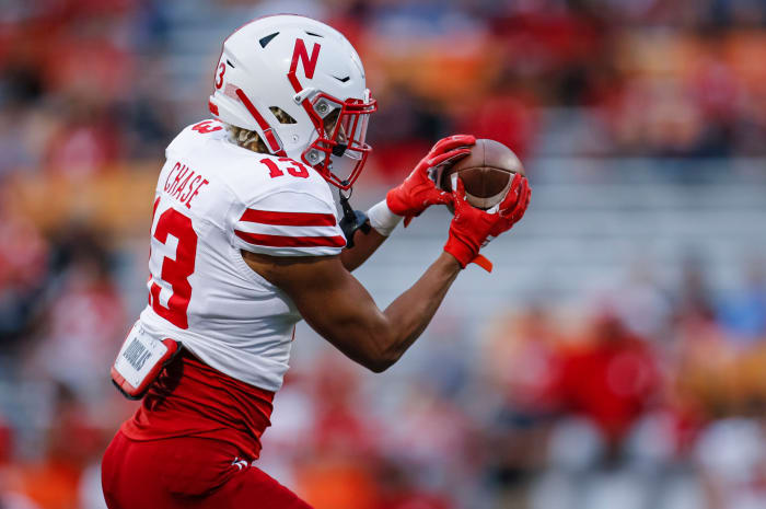 Nebraska receiver Darien Chase catches a pass during warmups.