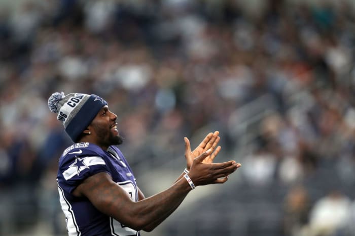 dez bryant claps on the field with the dallas cowboys