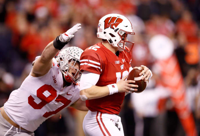 Ohio State's Nick Bosa sacking Wisconsin's QB Alex Hornibrook during Big Ten game.