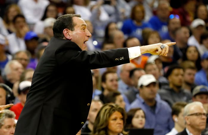 Coach K reacting to play during a Duke game.