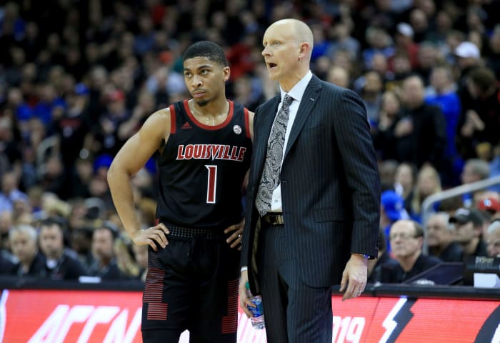 Chris Mack and Christen Cunningham of the Louisville Cardinals.