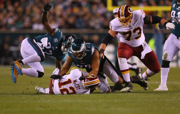 Colt McCoy sacked by the Philadelphia Eagles.