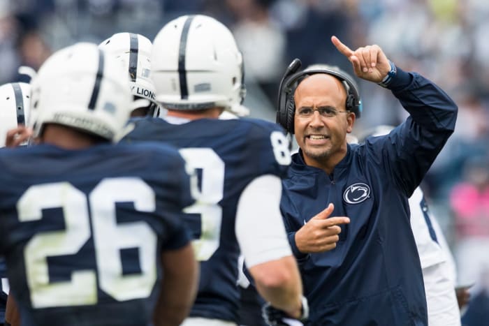 James Franklin directs Mike Gesicki during a game.