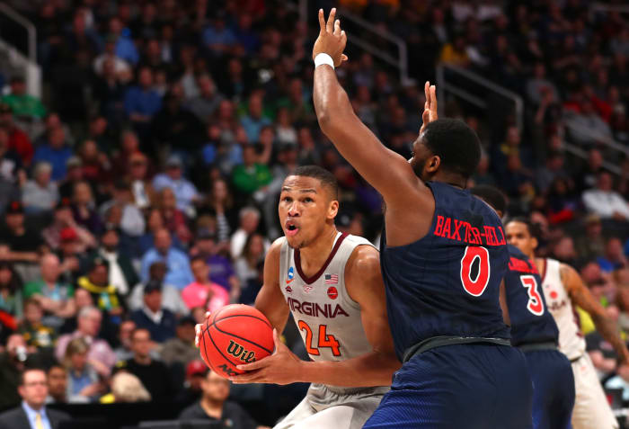 Kerry Blackshear for Virginia Tech tries to score.