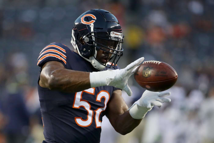 Khalil Mack catches a ball in warmups.