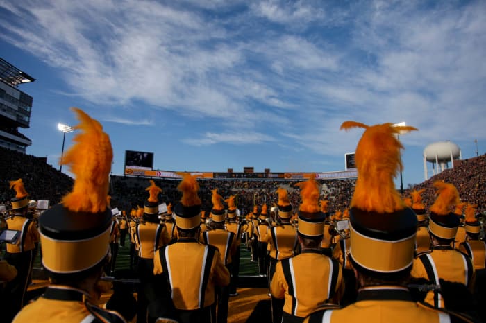 Iowa band members march against Purdue.