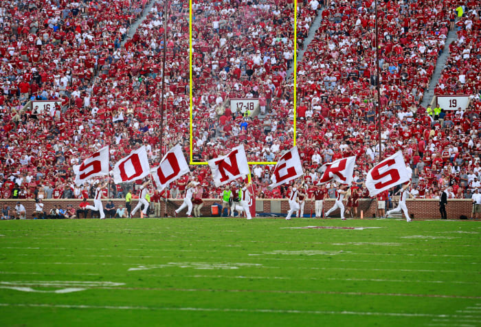 Oklahoma Sooners spirit squad celebrating a touchdown.