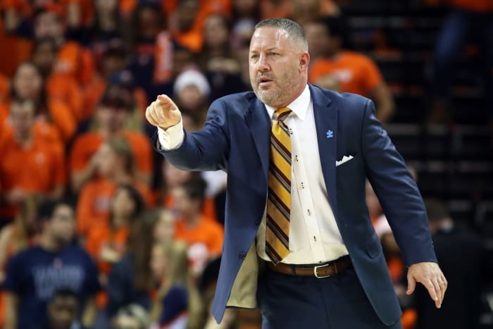 A closeup of Virginia Tech coach Buzz Williams pointing.