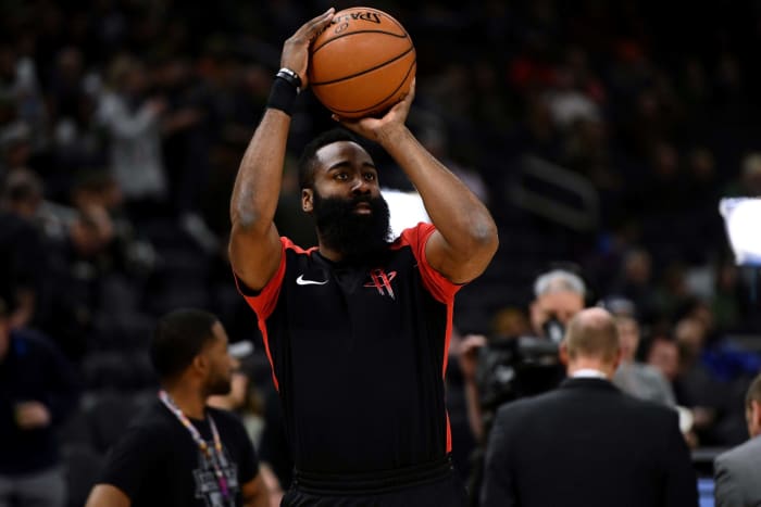 Houston Rockets star James Harden taking a shot during warmups.