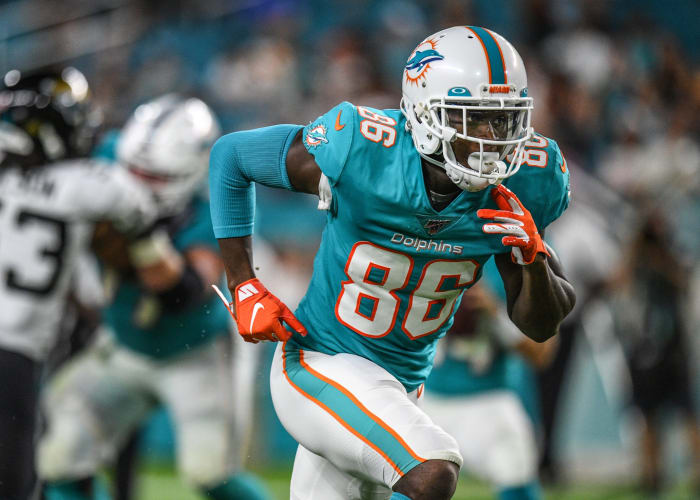 Dolphins WR Allen Hurns runs a route in a game.