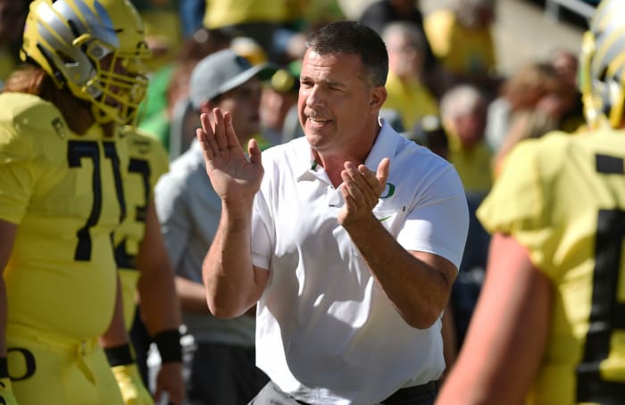A closeup of Oregon football coach Mario Cristobal.