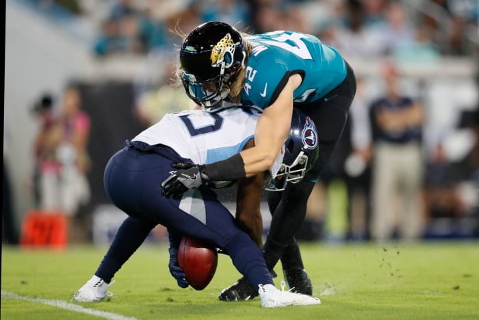 Adoree Jackson is tackled as he tries to scoop up a muffed punt.