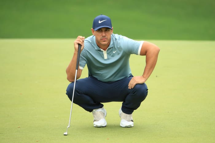 Brooks Koepka on the putting green.