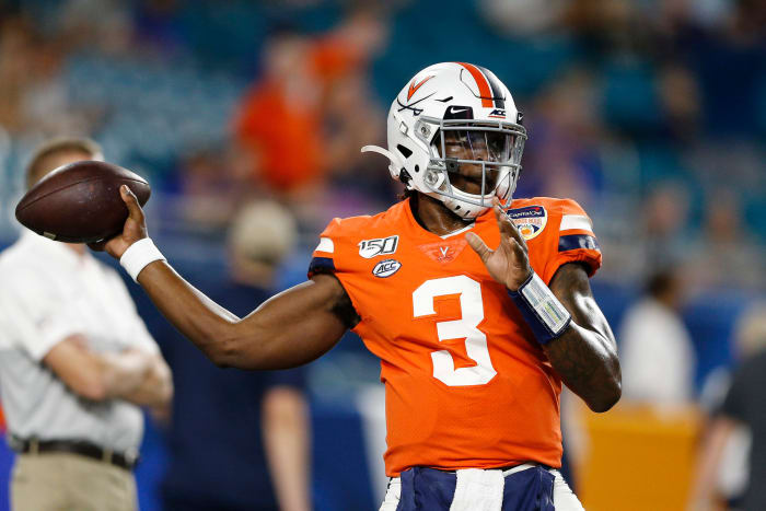 Bryce Perkins warms up for the Virginia Cavaliers.
