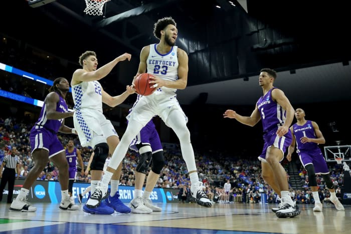 EJ Montgomery grabs a rebound for Kentucky against Abilene Christian.
