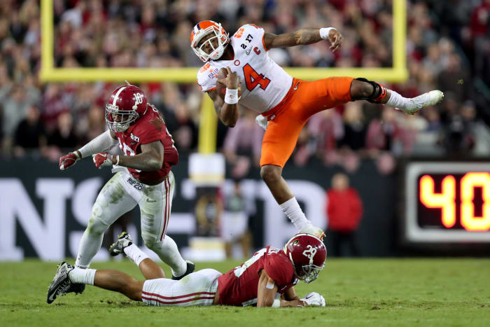 Deshaun Watson flying through the air.