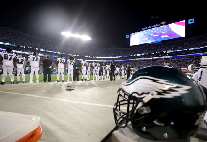 A closeup of a Philadelphia Eagles helmet on the sideline.