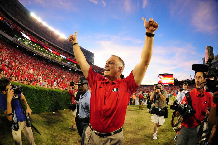 Mark Richt celebrating after a Georgia bulldogs win.