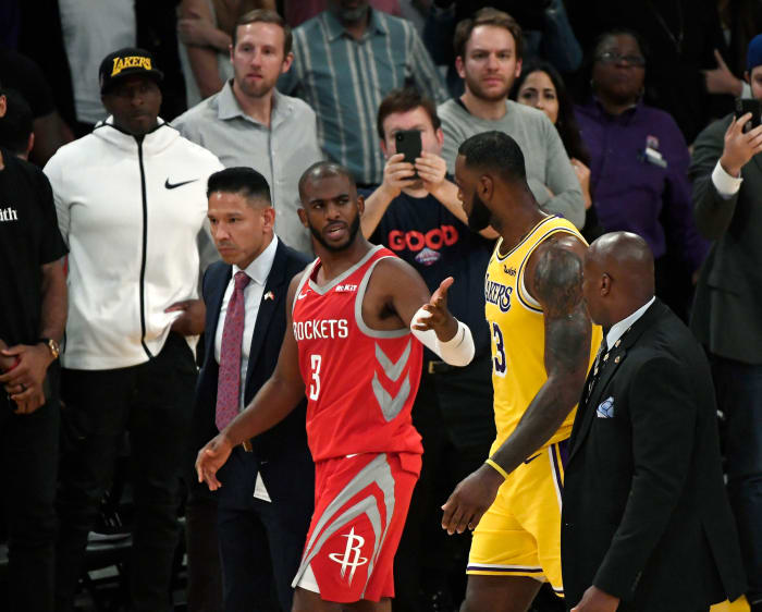 chris paul and lebron james talk during a game this season