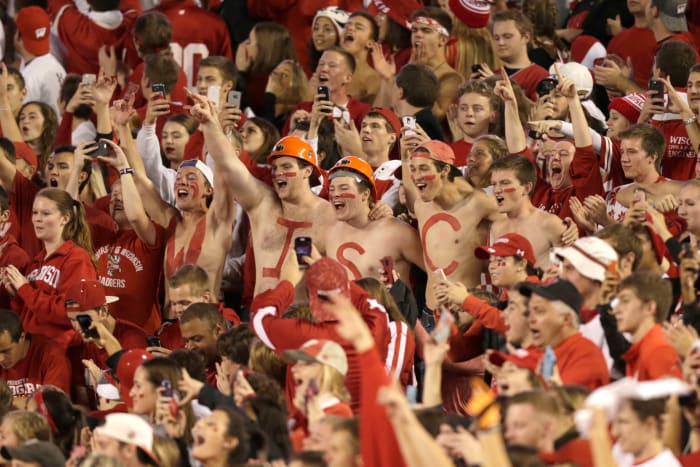 Wisconsin's fans paint their chests for a game.