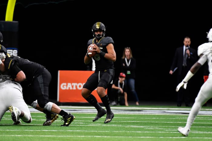 DJ Uiagalelei drops back to pass during the All-American Bowl.