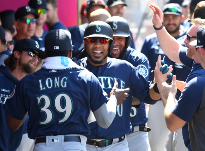 Edwin Encarnacion celebrates with the Seattle Mariners.