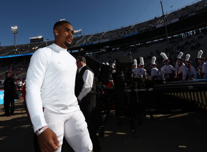Jalen Hurts soaks in the atmosphere at Oklahoma-Texas.