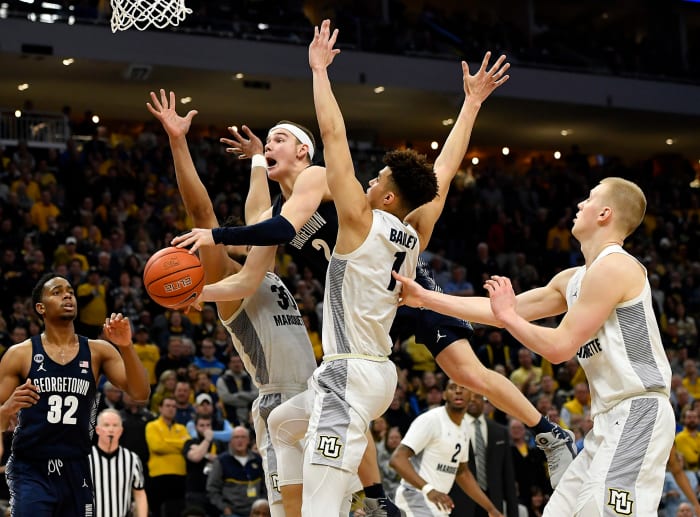 Mac McClung driving to the basket.
