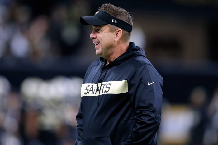 A closeup of New Orleans Saints coach Sean Payton wearing a black visor.