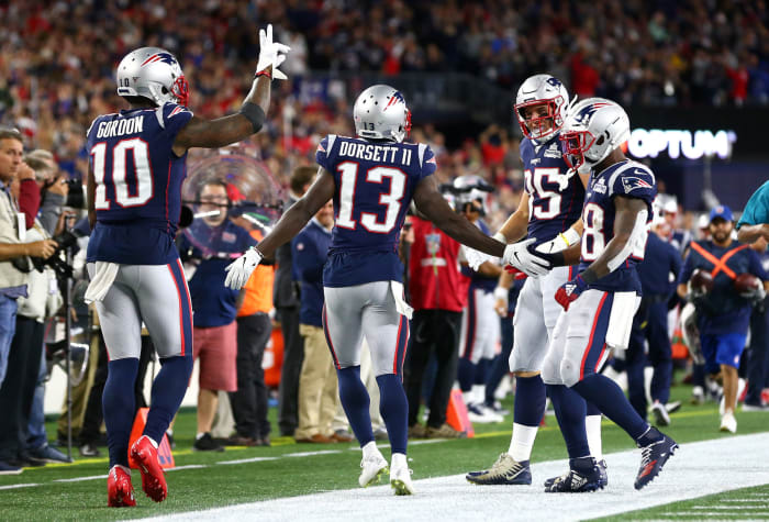 Phillip Dorsett celebrates a touchdown with his teammates.