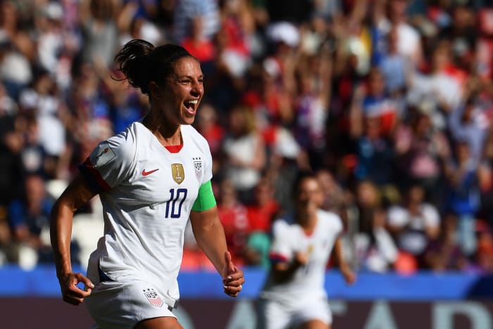 Carli Lloyd celebrates for the USWNT.