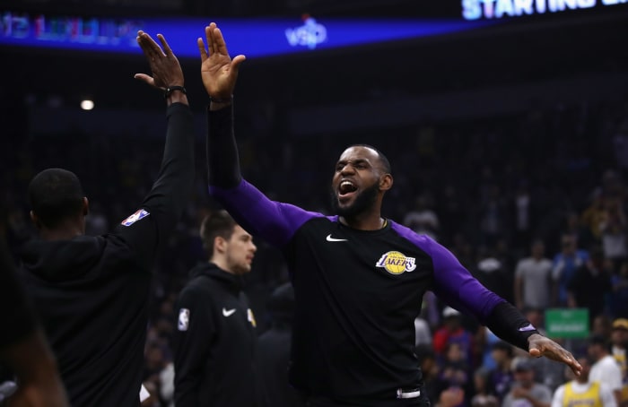 LeBron James celebrating with a teammate.