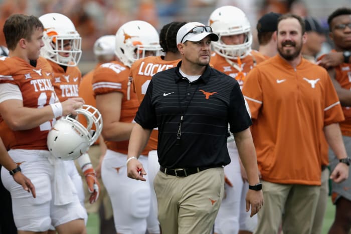 Tom Herman walking down the Texas Longhorns sideline.
