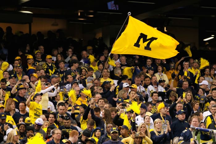 Fans of the Michigan Wolverines support their school against the Virginia Tech Hokies during the Allstate Sugar Bowl at Mercedes-Benz Superdome.
