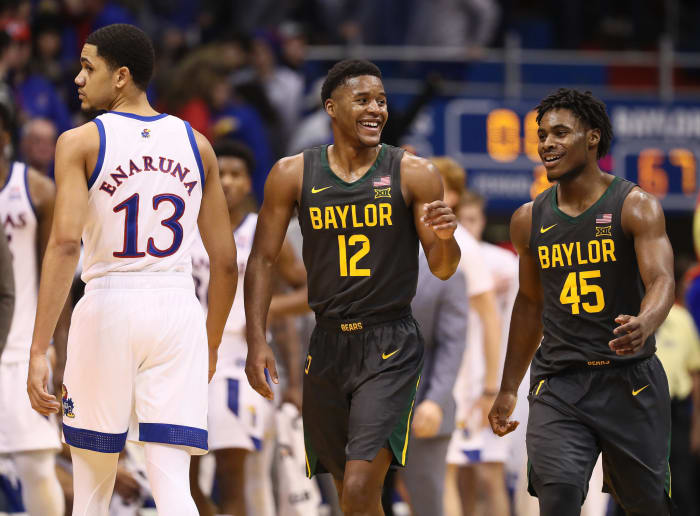 Jared Butler and Davion Mitchell celebrate win over Kansas.