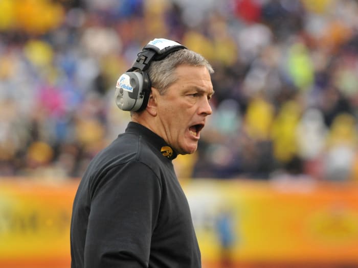 Kirk Ferentz makes a play call.