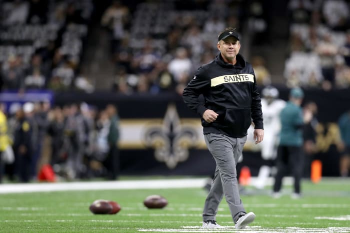 New Orleans Saints coach Sean Payton walking on the field during warmups.