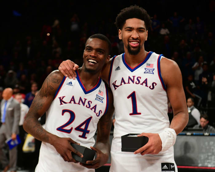 Kansas Jayhawks' Dedric Lawson and Lagerald Vick celebrate following the win.