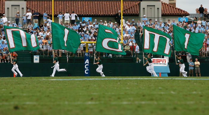 The Miami Hurricanes' cheerleaders celebrate in the end zone after a touchdown against the North Carolina Tar Heels.
