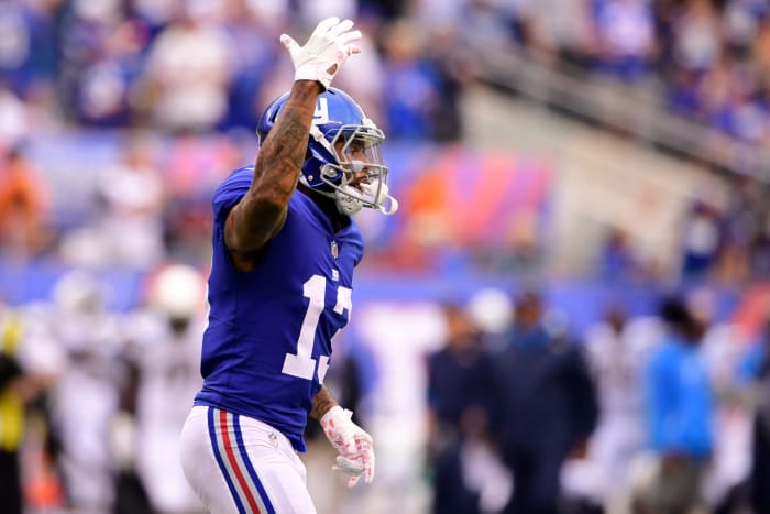 Odell Beckham Jr. raising his right arm.