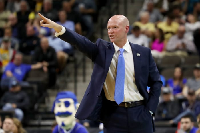 Kevin Willard points from the sideline during an NCAA Tournament game between Seton Hall and Wofford.