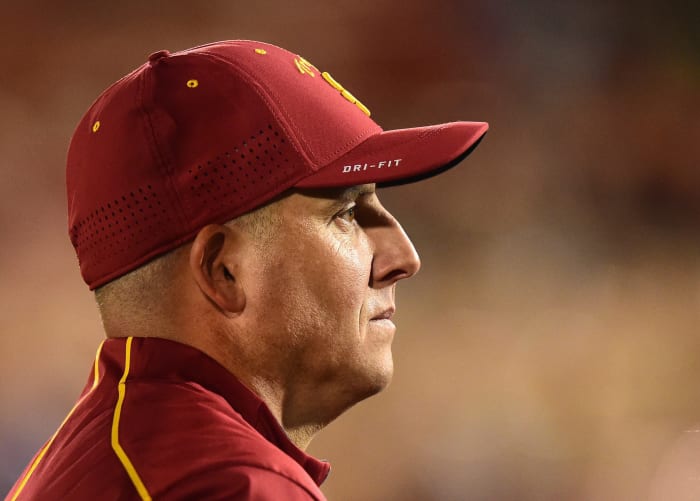 A closeup of Clay Helton in his USC football gear.